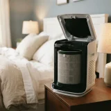 asset_0884d4e1a12d1d9d Winix Filter Z canister installed inside an open Winix C610 air purifier on a bedroom nightstand