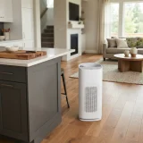 asset_0e57cb797d596b4c Winix C909 air purifier placed between a kitchen island and a living area after cooking
