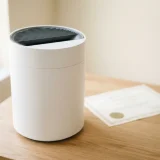 asset_2d7a04d9ec1796c6 Winix T500 air purifier displayed with an AHAM verification document on a table