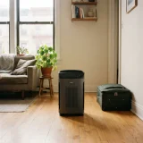 Winix 5500-2 air purifier standing alone in a small apartment living space