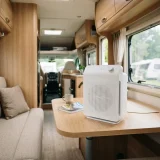 asset_54260104da8a2593 Winix T500 air purifier secured on a table inside a bright motorhome living area