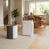 Large Filter B cartridge beside a whole-floor air purifier in an open-plan home