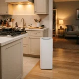 asset_6cbb22153d8ebe5c Winix C535 air purifier standing at the edge of an open kitchen and living area after cooking