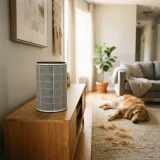 PetGuard filter cartridge on a console near a dog lying on a living-room rug