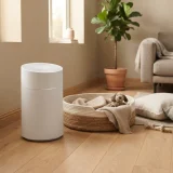 asset_9cc63cf4c170825b Winix A231 air purifier on the floor near a dog bed in a home with pets
