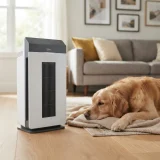 Winix 5520 air purifier on a living room floor beside a resting golden retriever