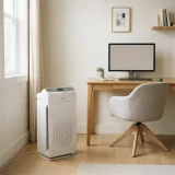 asset_c8d351adac8c1286 Winix C535 air purifier beside a desk with a chair and monitor in a small home office