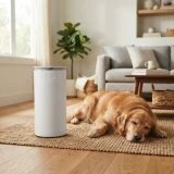 asset_cb60c77966331d22 Winix C535 air purifier running on the floor beside a dog resting on a rug