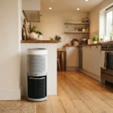 Air purifier and carbon filter cartridge at the edge of an open-plan kitchen